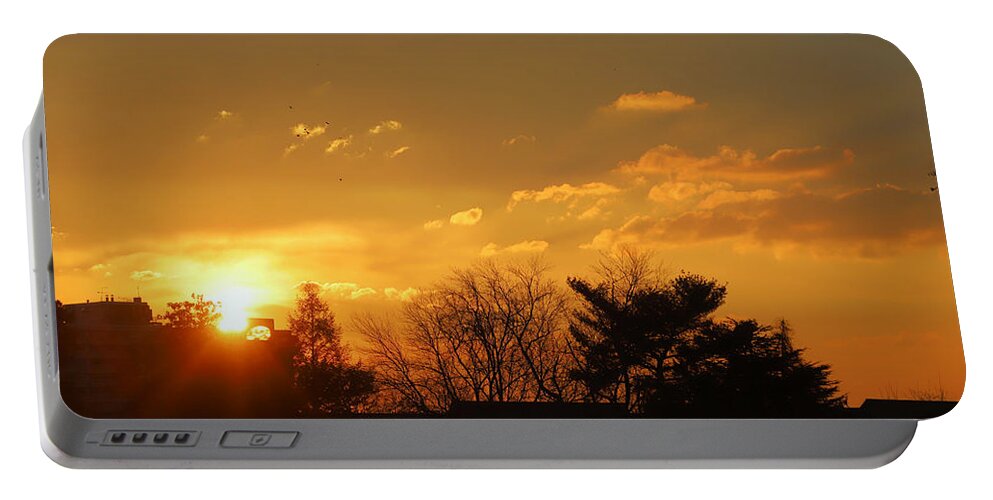 Morning Portable Battery Charger featuring the photograph Sunrise with Birds in Flight Dawn Breaks Free of Highrise February 20 2021 by Miriam A Kilmer