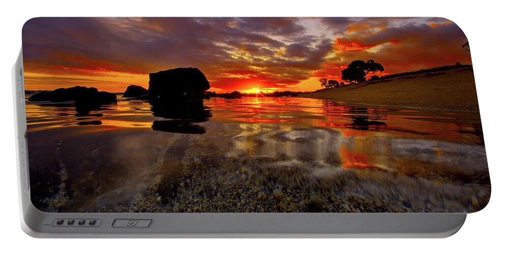 Hawaii Portable Battery Charger featuring the photograph Sunset in the Water by John Bauer