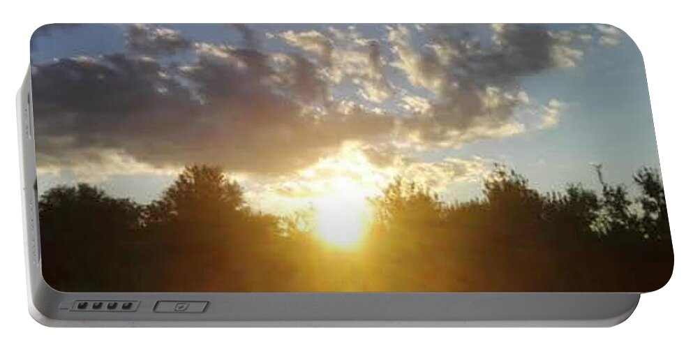 Sun Portable Battery Charger featuring the photograph Sunset by Mopssy Stopsy