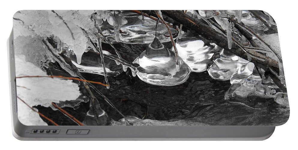  Portable Battery Charger featuring the photograph Teardrop ice by Nicola Finch