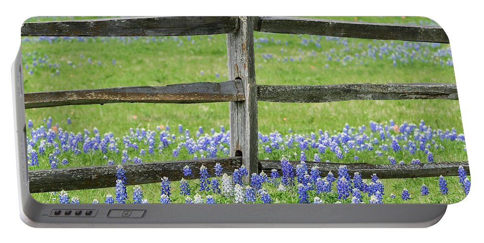 Ennis Portable Battery Charger featuring the photograph Texas Bluebonnets Along Fence Line by Robert Bellomy