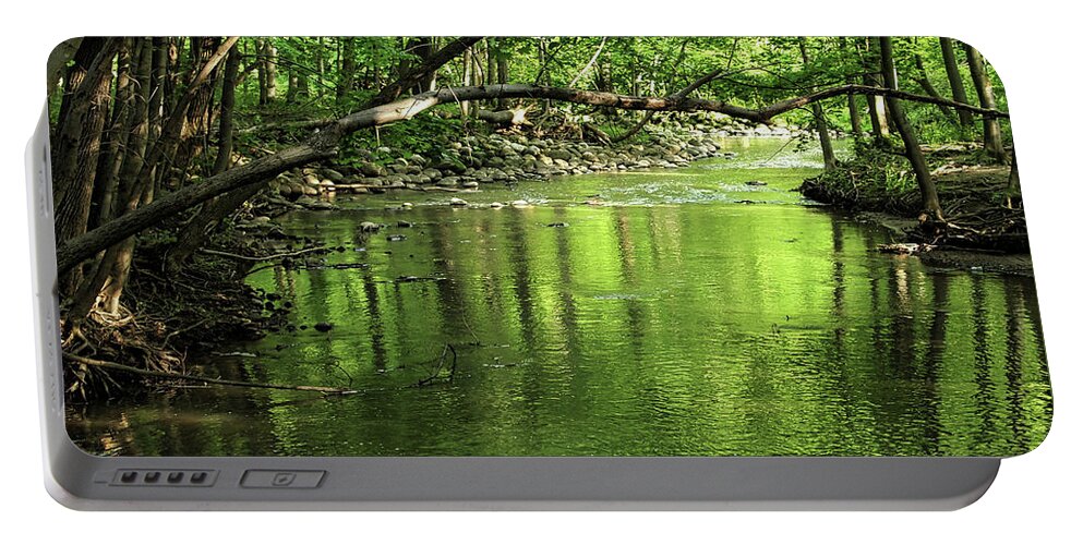Spring Portable Battery Charger featuring the photograph The babbling brook by Scott Olsen