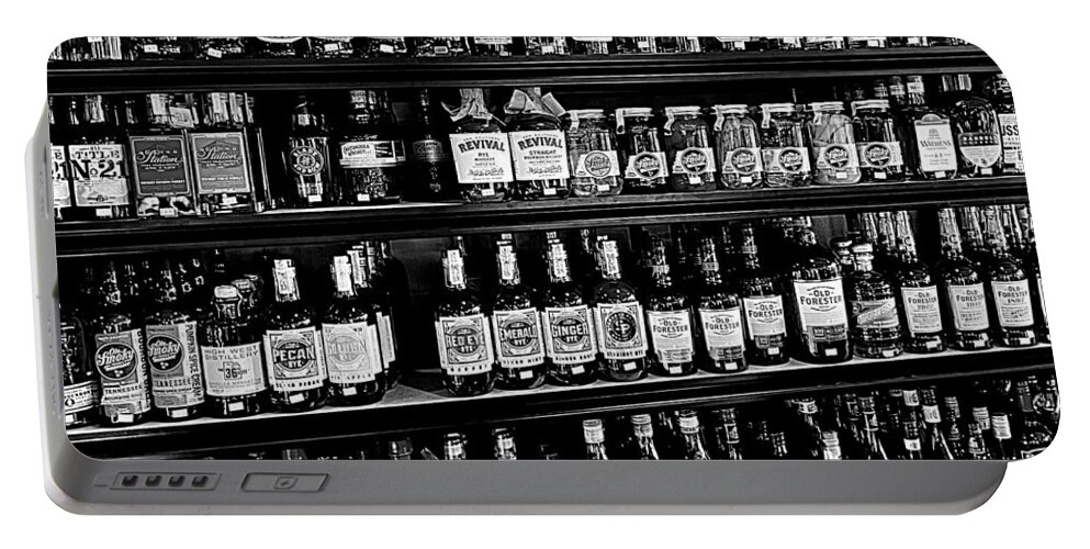 Liquor Portable Battery Charger featuring the photograph The Candy Store BW by Lee Darnell