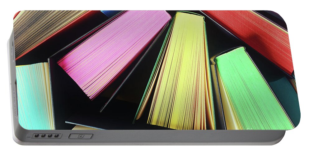 Books Portable Battery Charger featuring the photograph The colors of knowledge by Mendelex Photography