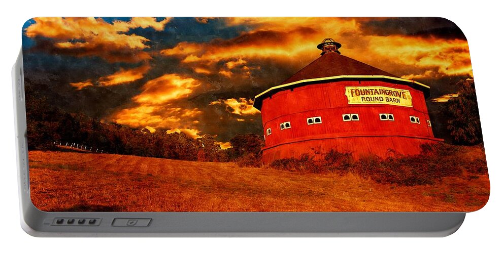 Fountaingrove Portable Battery Charger featuring the digital art The Fountaingrove Round Barn, near Santa Rosa, California, in sunset light by Nicko Prints