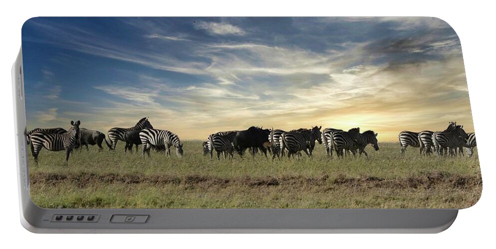 Zebra Portable Battery Charger featuring the photograph The Great Migration by Carolyn Mickulas
