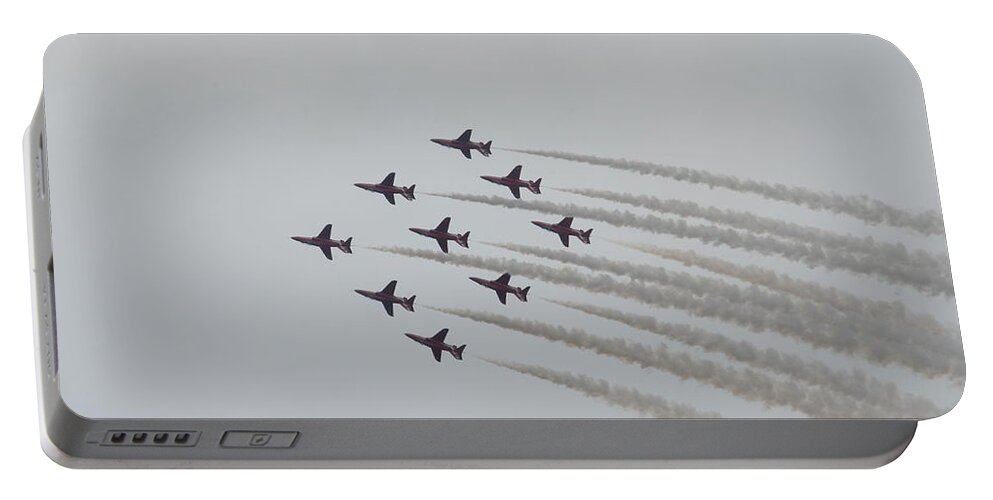 21st Century Portable Battery Charger featuring the photograph The Red Arrows doing a Loop in the Diamond 9 by Gordon James
