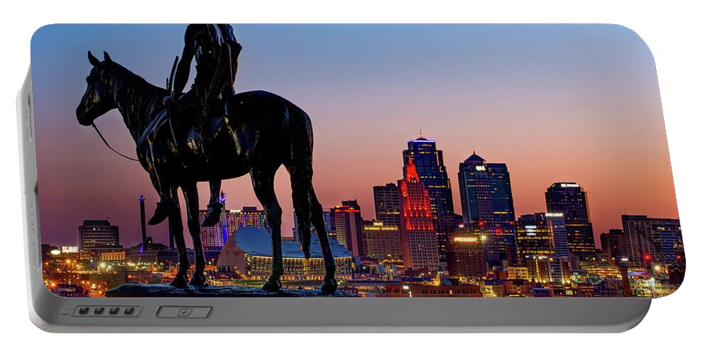Kansas City Scout Portable Battery Charger featuring the photograph The Scout and the Kansas City Downtown Skyline at Dawn by Gregory Ballos