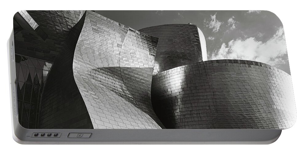 Guggenheim Museum Portable Battery Charger featuring the photograph Titanium Shapes by Josu Ozkaritz