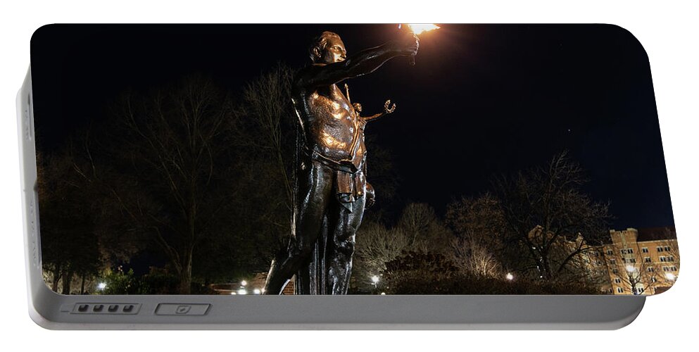 University Of Tennessee At Night Portable Battery Charger featuring the photograph Torchbearer statue at the University of Tennessee at night by Eldon McGraw