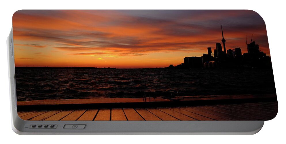 Toronto Portable Battery Charger featuring the photograph Toronto Sunset With Boardwalk by Kreddible Trout