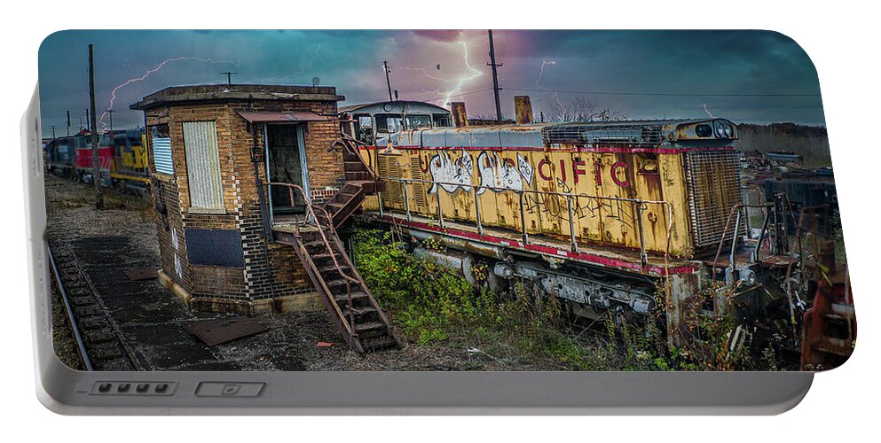  Portable Battery Charger featuring the photograph Train Graveyard by Brian Jones