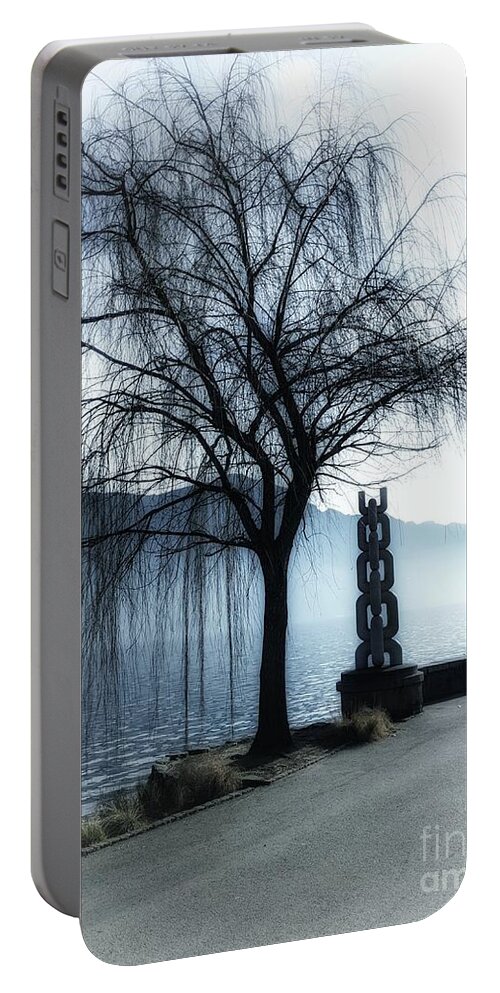 Tee Portable Battery Charger featuring the photograph Tree And Its Statue by Claudia Zahnd-Prezioso