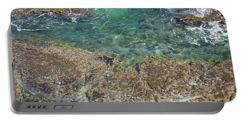 Turquoise Portable Battery Charger featuring the photograph Turquoise Blue Water And Rocks On The Coast by Adriana Mueller