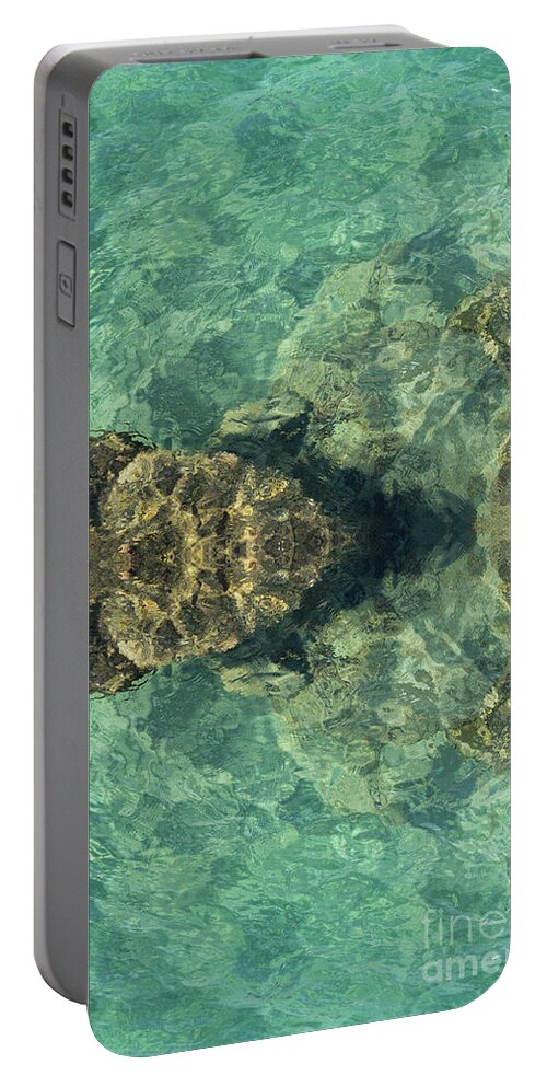 Turquoise Portable Battery Charger featuring the digital art Turquoise sea water and rocks by Adriana Mueller