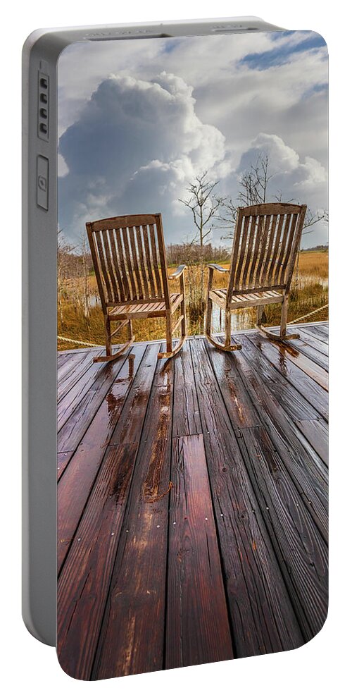 Clouds Portable Battery Charger featuring the photograph Two Chairs after the Rain by Debra and Dave Vanderlaan
