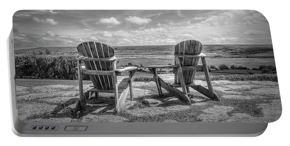 Clouds Portable Battery Charger featuring the photograph Two Chairs Under a Big Sky in Black and White by Debra and Dave Vanderlaan