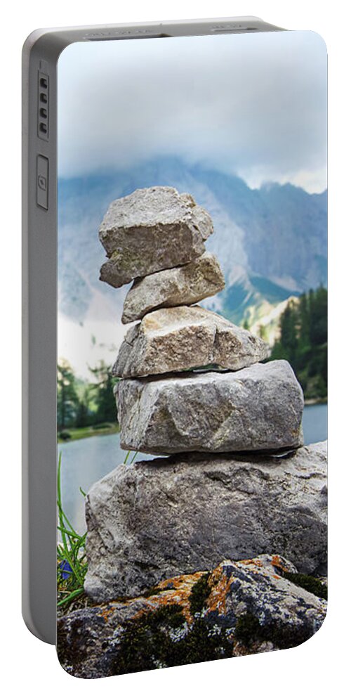 Two Portable Battery Charger featuring the photograph Two stone towers as route markers. by Bernhard Schaffer