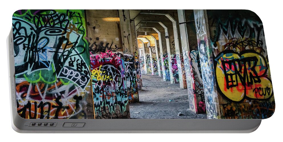 Graffiti Pier Portable Battery Charger featuring the photograph Under the Pier by Darrell DeRosia