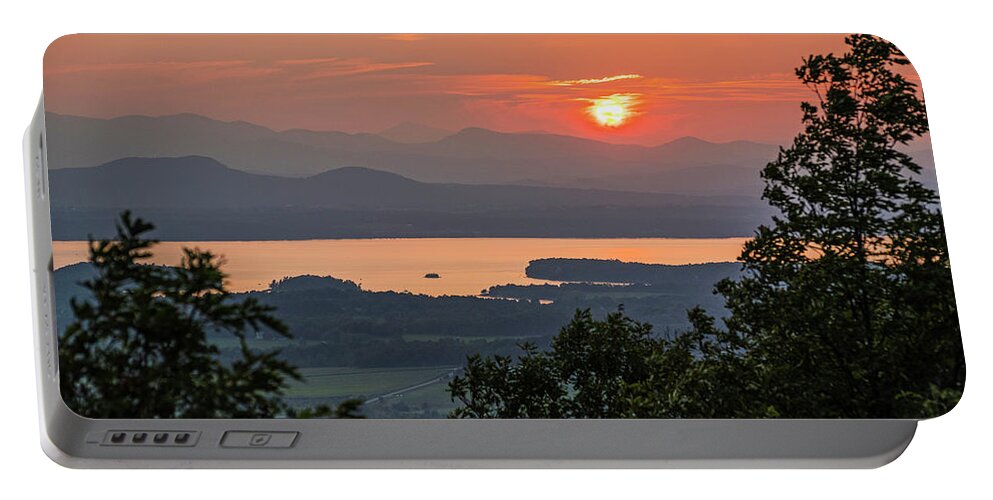 Adirondacks Portable Battery Charger featuring the photograph Vibrant sunset through trees Lake Champlain and the Adirondacks from Mount Philo Charlotte Vermont by Toby McGuire