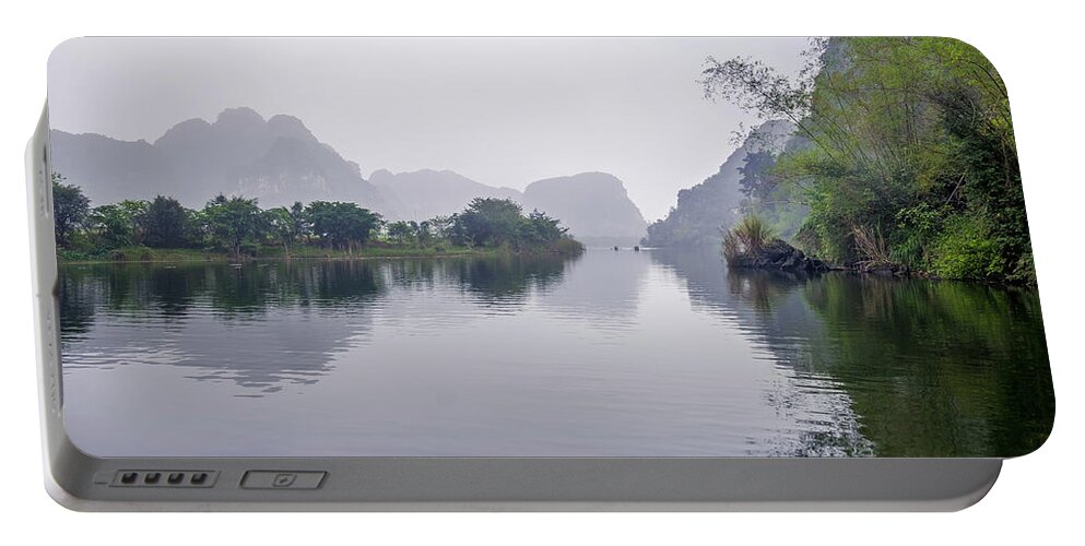 Ba Giot Portable Battery Charger featuring the photograph View at Tam Coc by Arj Munoz