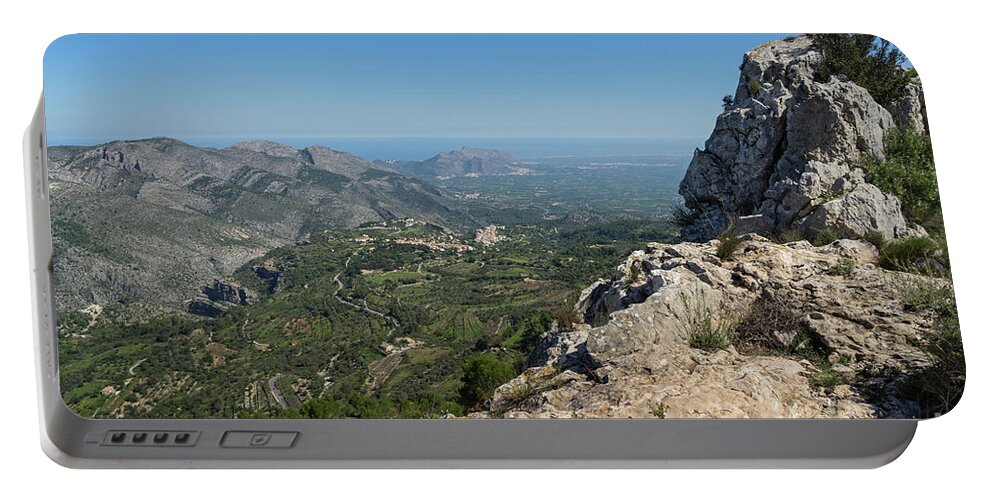 Mountain Ridge Portable Battery Charger featuring the photograph Fields and mountains near the Mediterranean coast by Adriana Mueller