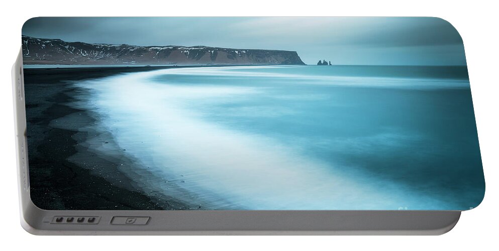 Vik Black Beach Portable Battery Charger featuring the photograph Vik black beach and Reynisdrangar rocks, Iceland by Neale And Judith Clark