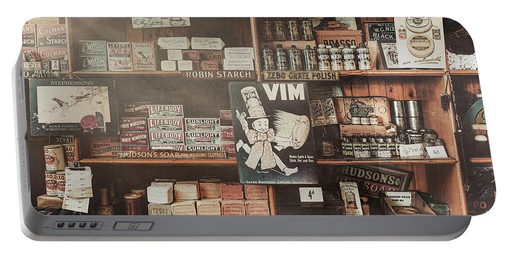 Store Portable Battery Charger featuring the photograph Vintage Soap Store by Dave Bowman