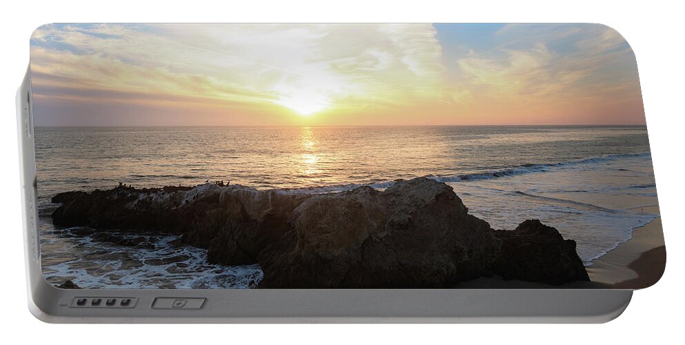 Beach Portable Battery Charger featuring the photograph Vivid Winter Sunset Over the Ocean by Matthew DeGrushe