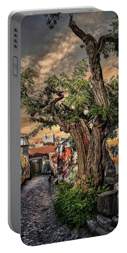 Lisbon Portable Battery Charger featuring the photograph Walking in history's footsteps by Micah Offman