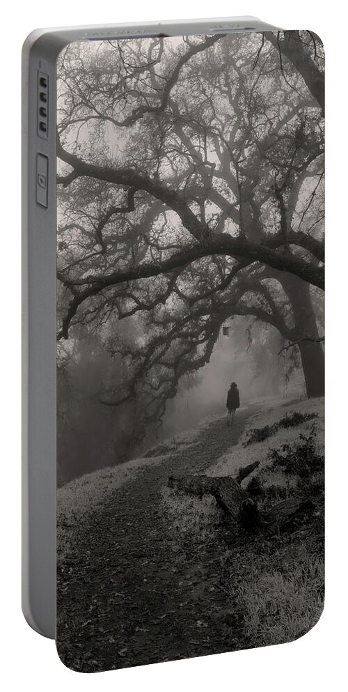 Walking Away Portable Battery Charger featuring the photograph Walking into the misty forest path by Alessandra RC
