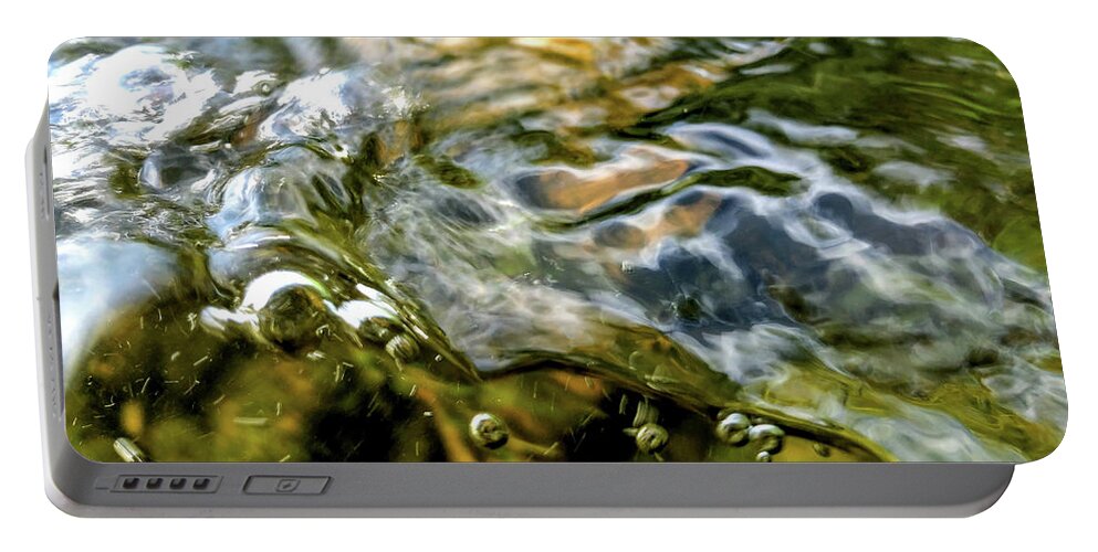 Water Portable Battery Charger featuring the photograph Water Flowing in a Stream by Amelia Pearn