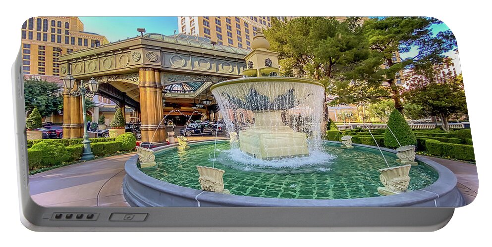 Bellagio Hotel Portable Battery Charger featuring the photograph Water Fountain Outside Bellagio Las Vegas by FeelingVegas Wall Art and Prints