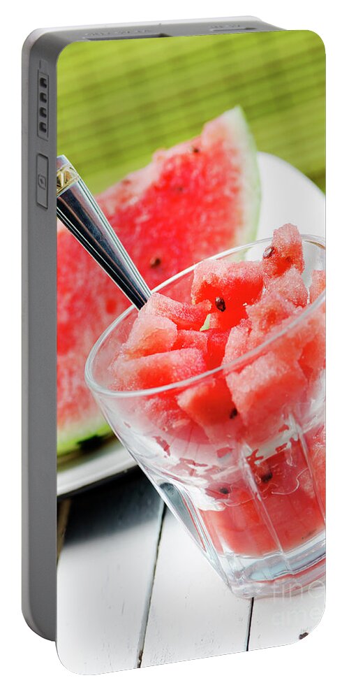 Watermelon Portable Battery Charger featuring the photograph Watermelon slice and melon sweet dessert smoothie on white table by Jelena Jovanovic