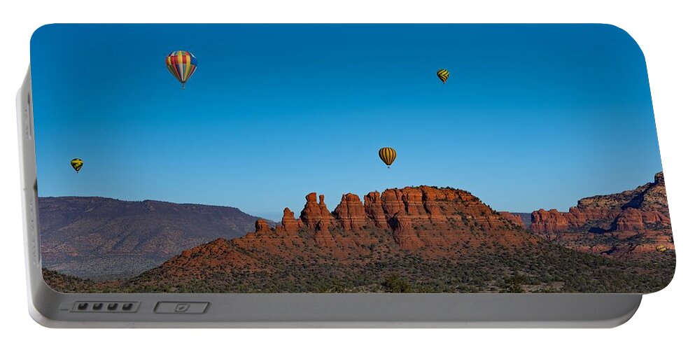 Sedona Portable Battery Charger featuring the photograph We're off to see the Wizard by Carolyn Mickulas