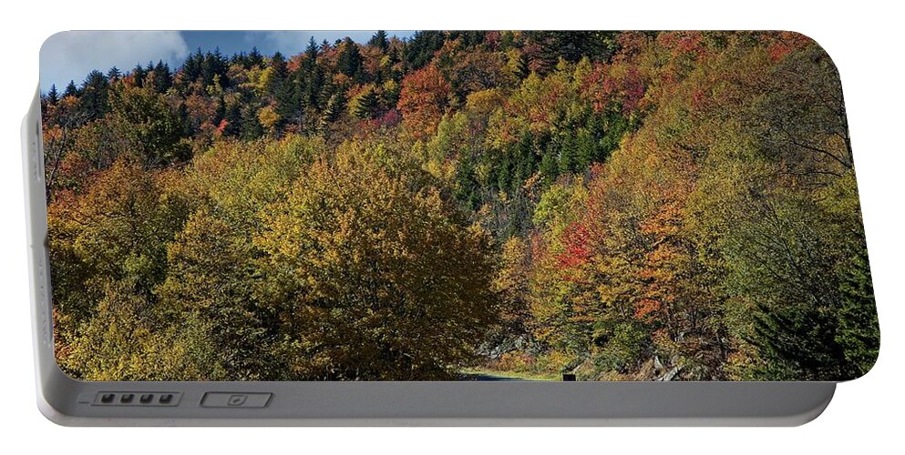 Autumn Portable Battery Charger featuring the photograph What a Colorful Ride by Ronald Lutz