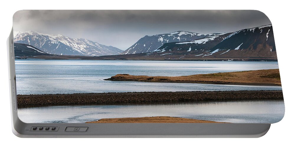 Iceland Portable Battery Charger featuring the photograph Winter mountain landscape and frozen lake Iceland by Michalakis Ppalis