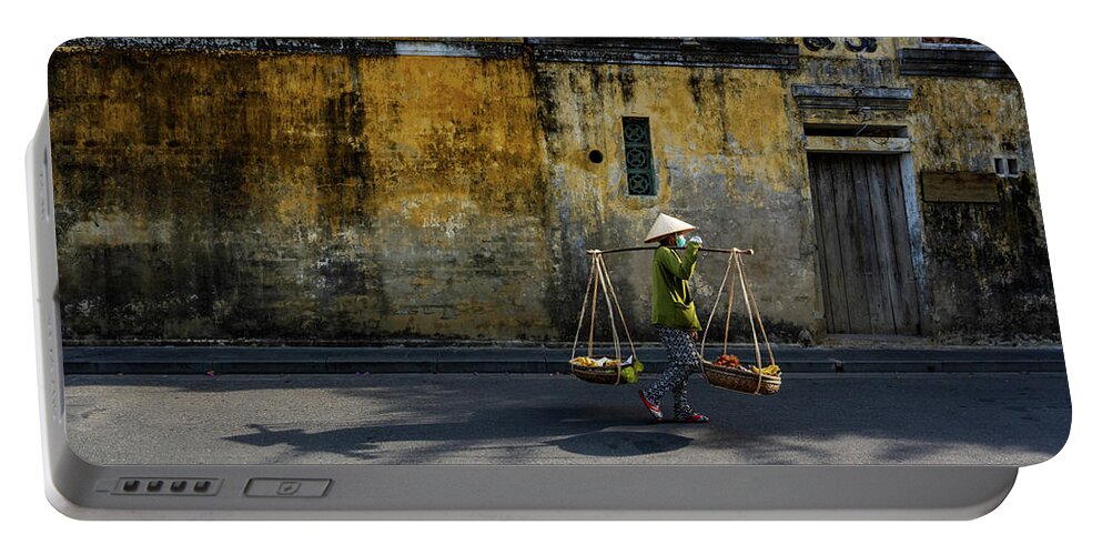 Awesome Portable Battery Charger featuring the photograph Woman selling street on Hoi An ancient town by Khanh Bui Phu