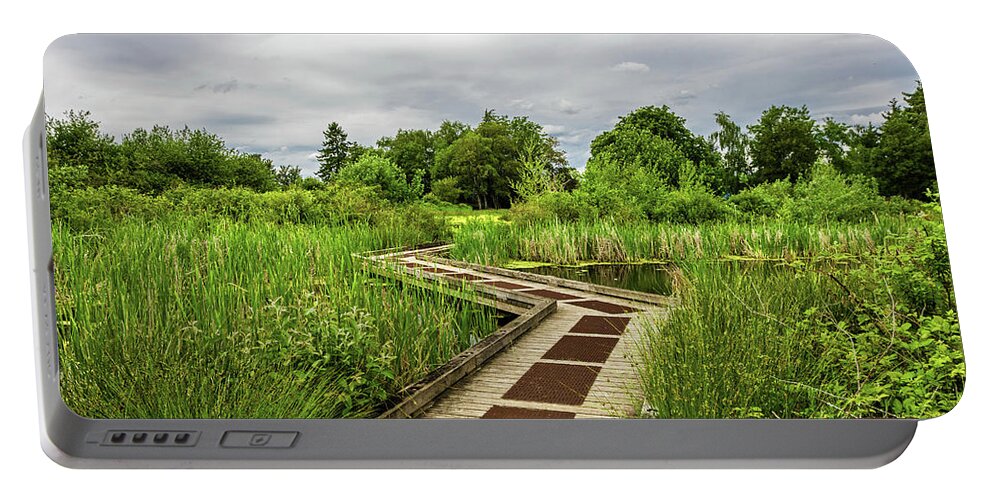Alex Lubar Portable Battery Charger featuring the photograph Wooden walking path in the natural park by Alex Lyubar