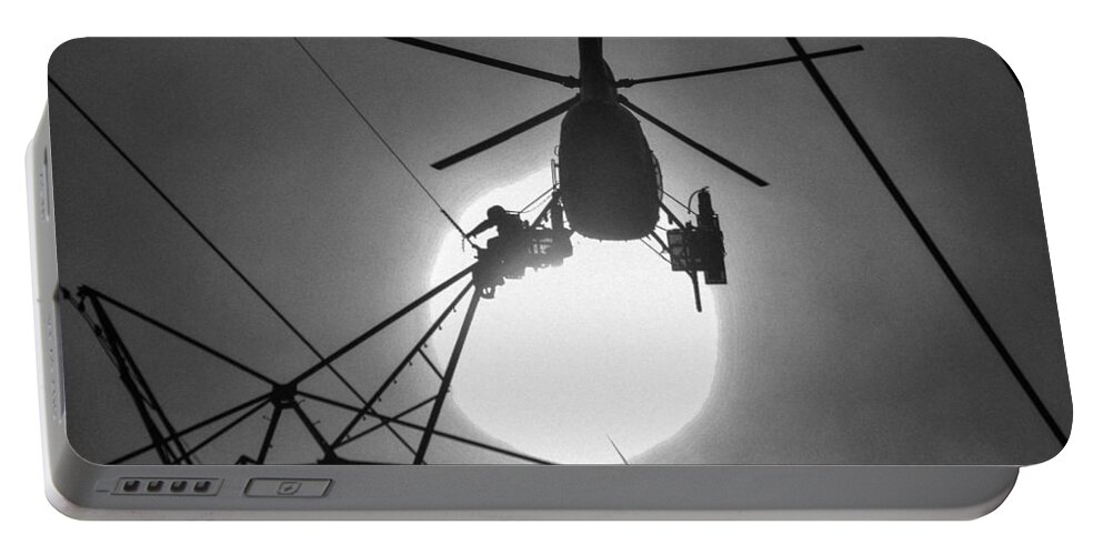 Helicopter Portable Battery Charger featuring the photograph Working On the Wire by Addison Likins
