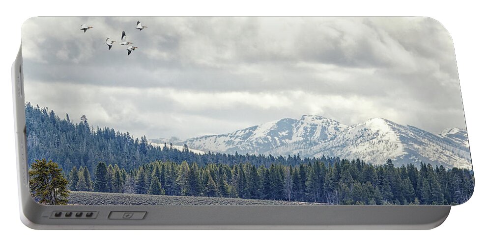Pelican Portable Battery Charger featuring the photograph Yellowstone Flight by Natural Focal Point Photography