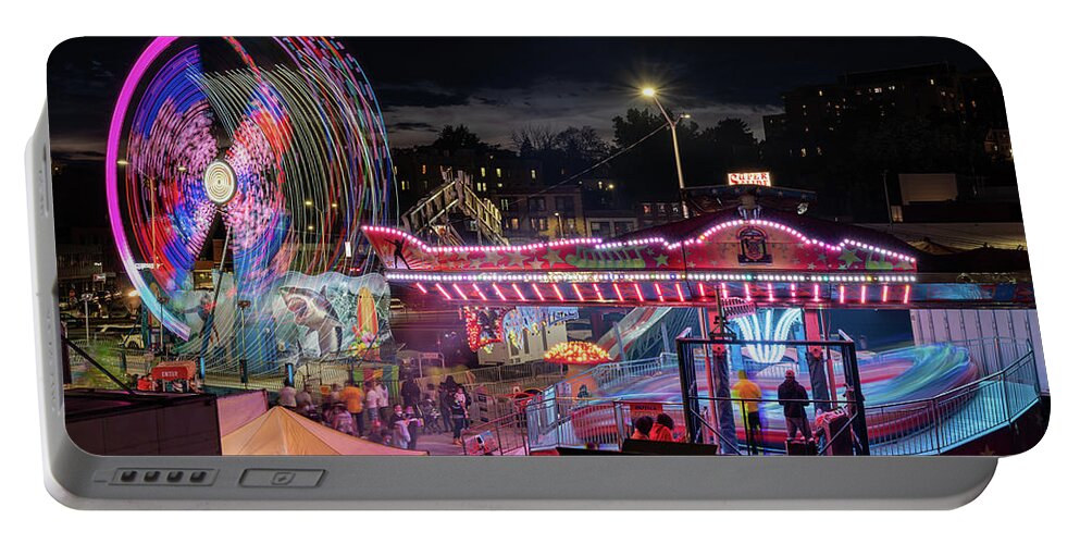 Spring Portable Battery Charger featuring the photograph Yonkers Dowtown Carnival by Kevin Suttlehan