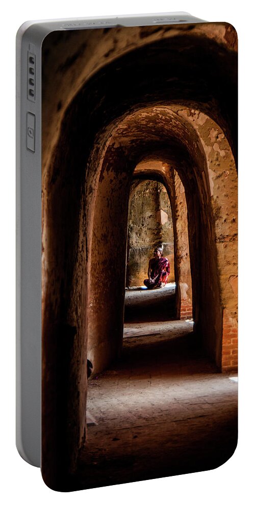 Buddhist Portable Battery Charger featuring the photograph Young Buddhist Monk Praying by Arj Munoz