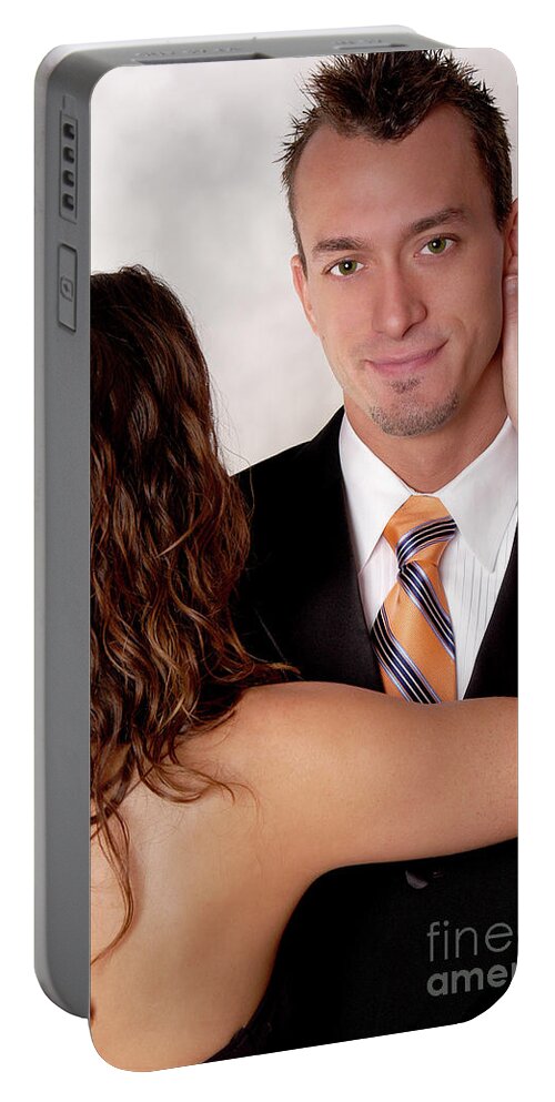 Couple Portable Battery Charger featuring the photograph Young handsome office man with young woman by Gunther Allen