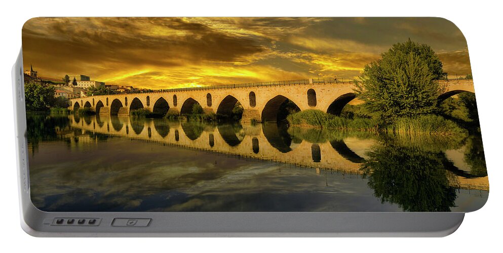 Sunset Portable Battery Charger featuring the photograph Zamora's Roman Bridge by Micah Offman