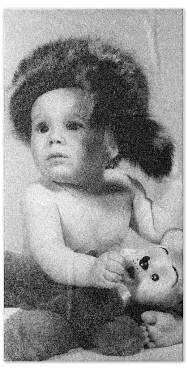 Photography Beach Towel featuring the photograph 1960s Baby Wearing Coonskin Hat by Vintage Images