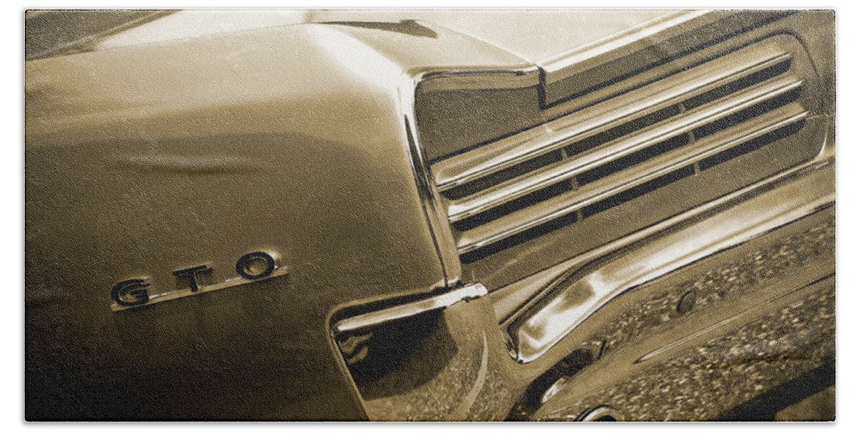 1966 Beach Towel featuring the digital art 1966 Pontiac GTO Tail in Sepia by Gordon Dean II
