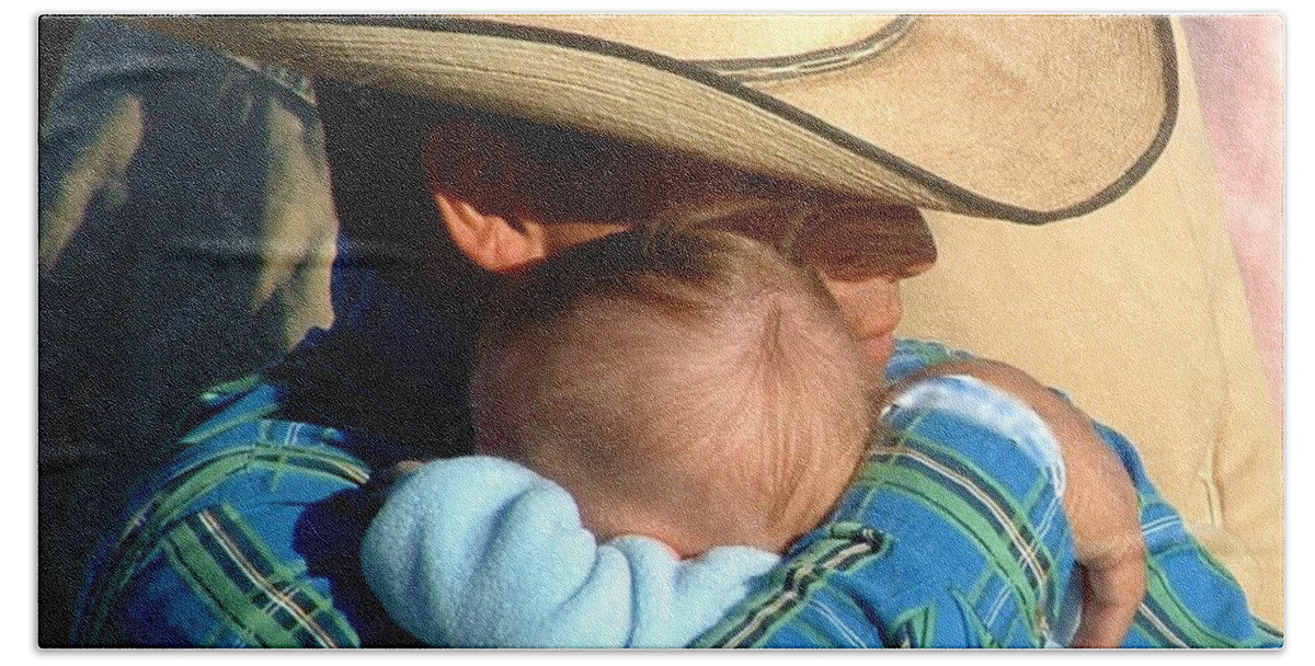 Cowboy With Baby Beach Towel featuring the photograph A Cowboy's Love by Marilyn Smith