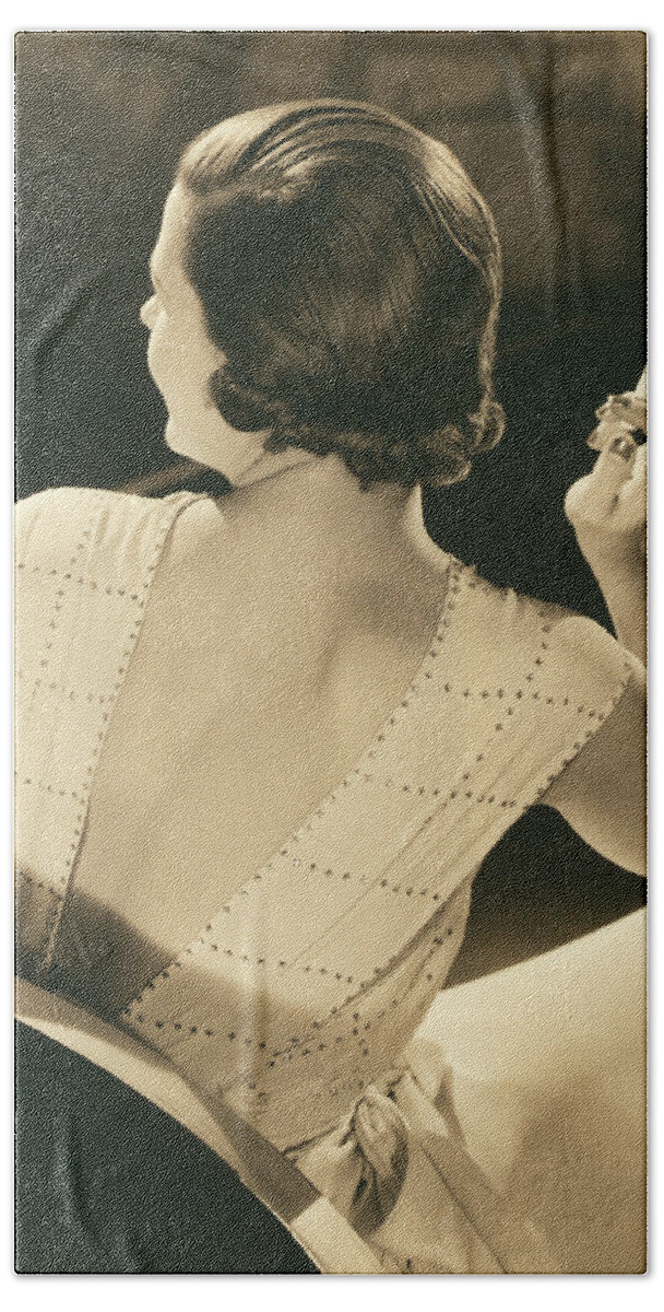 1932 Beach Towel featuring the photograph A Glamourous Woman Smoking by Underwood Archives