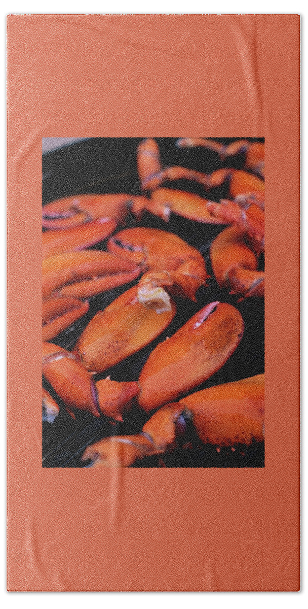 A Group Of Lobster Claws On A Grill Beach Towel
